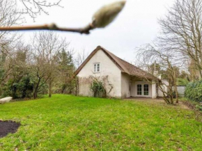 Charming beach villa with thatched roof